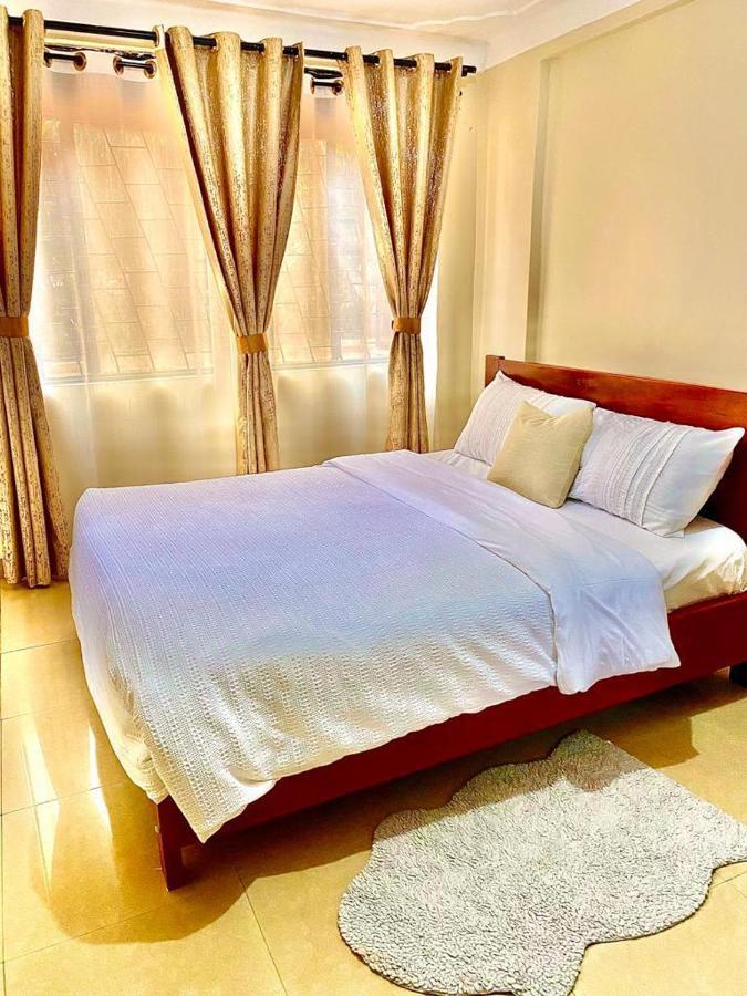 Golden Cherries Guest House Джинджа Экстерьер фото